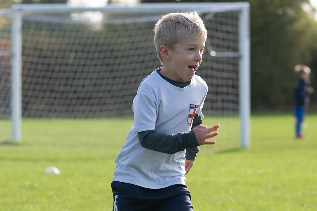 Young footballer taking part in an NH Football Coaching session