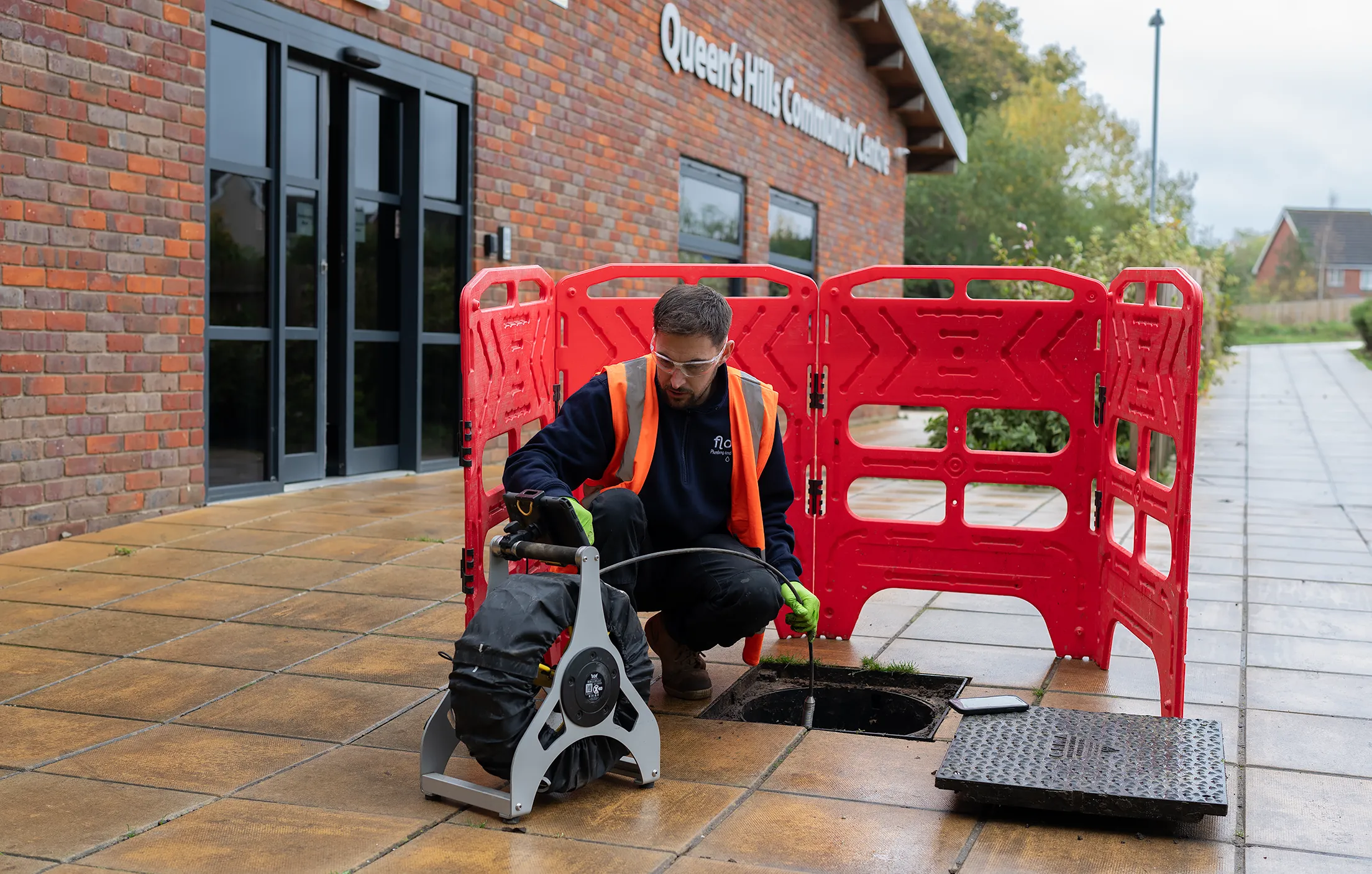 Flow Plumbing and Drainage engineer carrying out drainage work