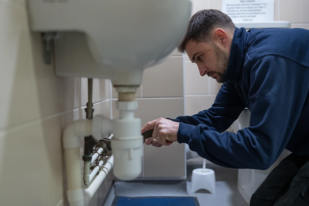 Flow Plumbing and Drainage engineer carrying out plumbing work