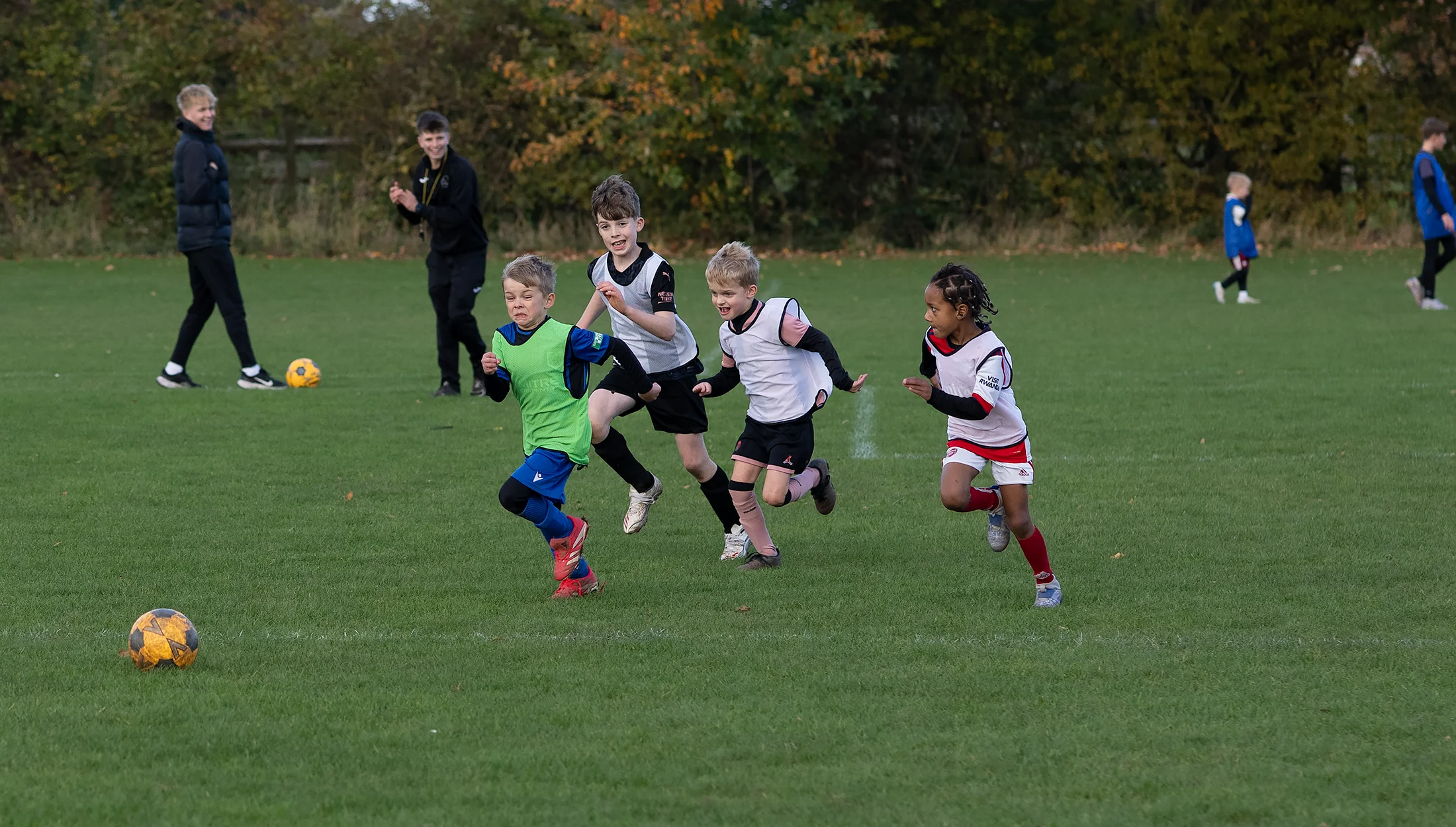 NH Football Coaching session with young players on the football pitch
